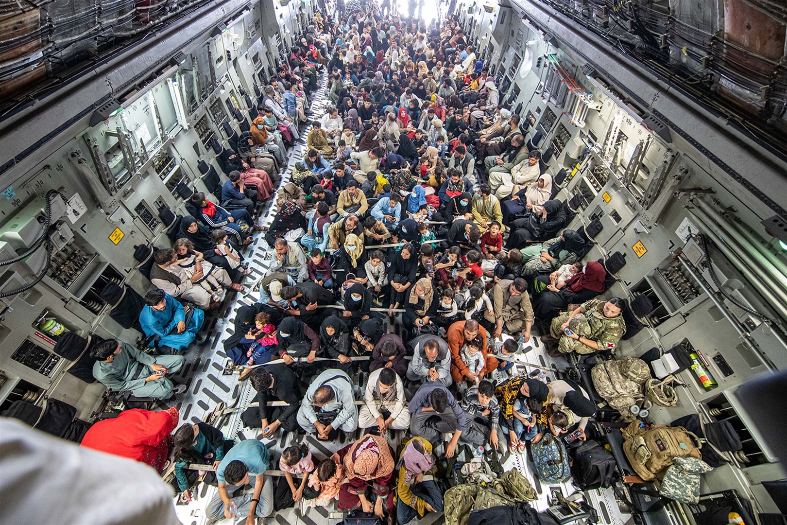  A full flight of 265 people supported by members of the UK Armed Forces on board an evacuation flight out of Kabul airport, Afghanistan (MoD/PA)
