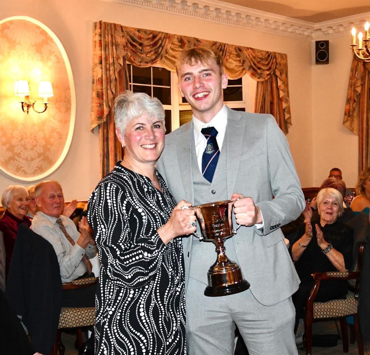 Ann Mackintosh hands over the the Calum Mackintosh Trophy in memory of her son to the club’s most improved player of the season, Jack Nelson.