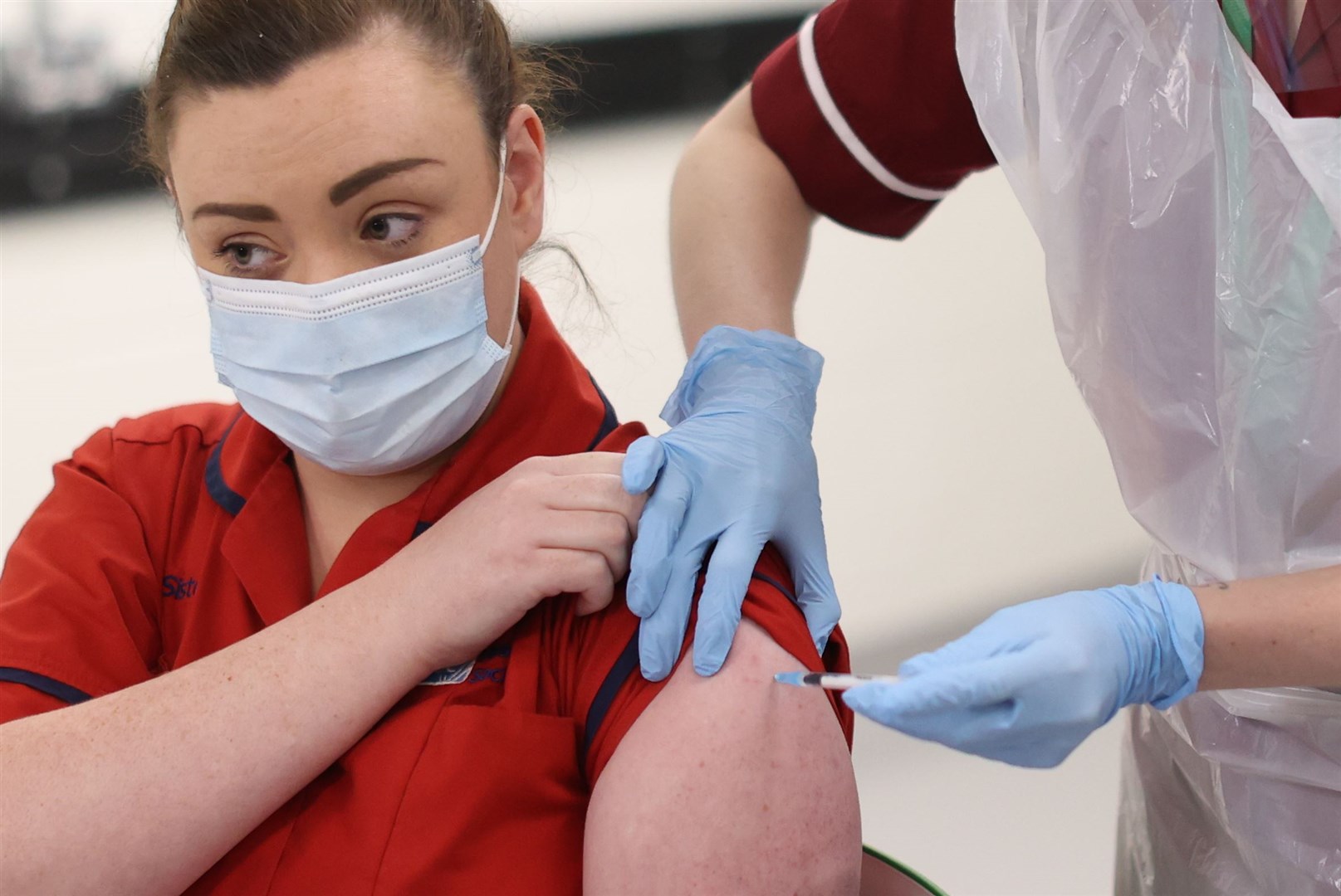 Sister Joanna Sloan becomes the first person in Northern Ireland to receive the vaccine jab (Liam McBurney/PA)