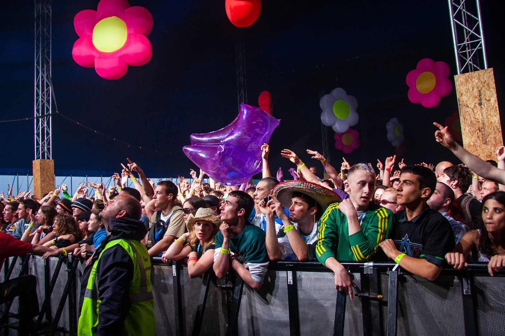 At the front of the stage in the tent for Daft Punk, with Jim King the promoter in a high-vis jacket looking up at Daft Punk on the stage. Picture: Paul Campbell