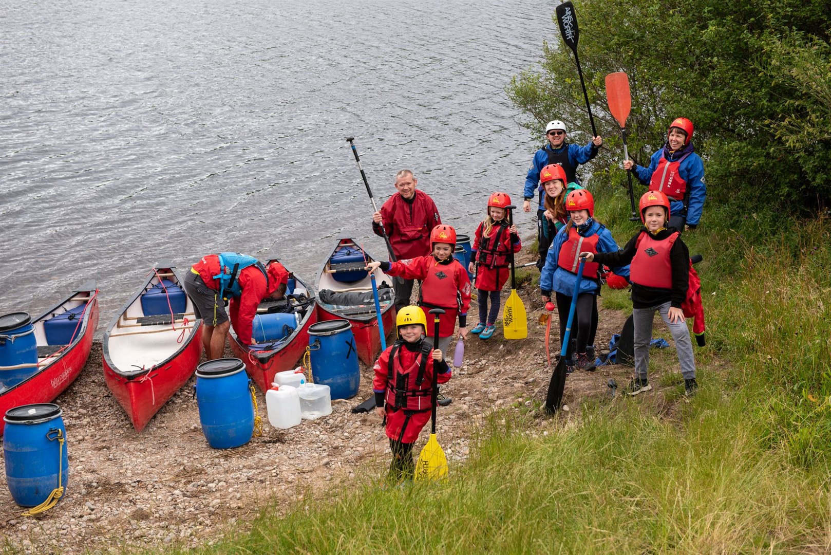 Having their kayak and eating it: one of the happy parties at Abernethy