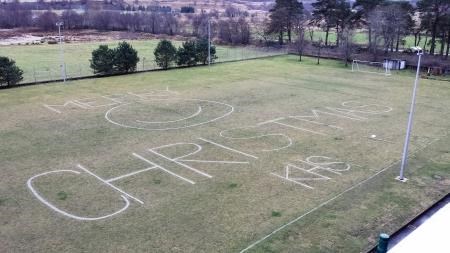 The festive greeting on the school's pitch