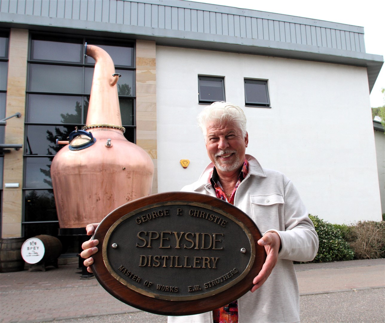 A piece of history... The sign for the Speyside Distillery - now classed as a lost distillery - being shown off by Speyside Distillers Company Ltd boss John Harvey McDonough at the Macdonald Aviemore Resort ahead of last night’s launch of the famous whisky festival.