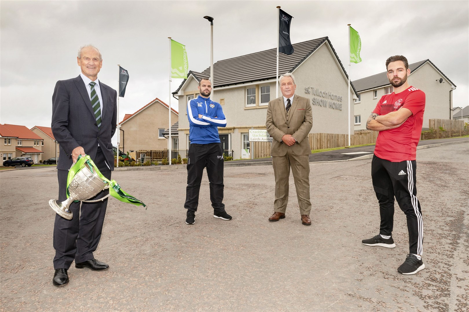 READY FOR THE BIG DAY: George Fraser of Tulloch Homes, Newtonmore captain Evan Menzies, Camanachd Association President Keith Loades and Oban Camanachd captain Daniel Cameron.