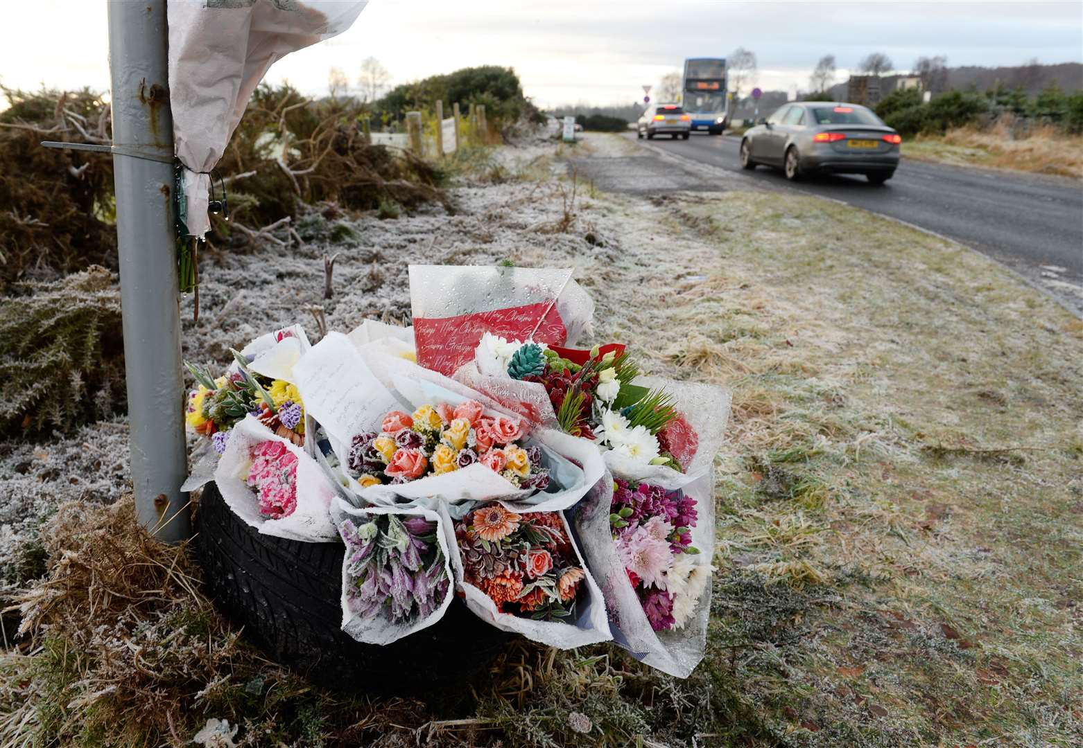 Floral tributes were left at the junction of the A9 and B9161 where popular teenager Gregor McIntosh died.