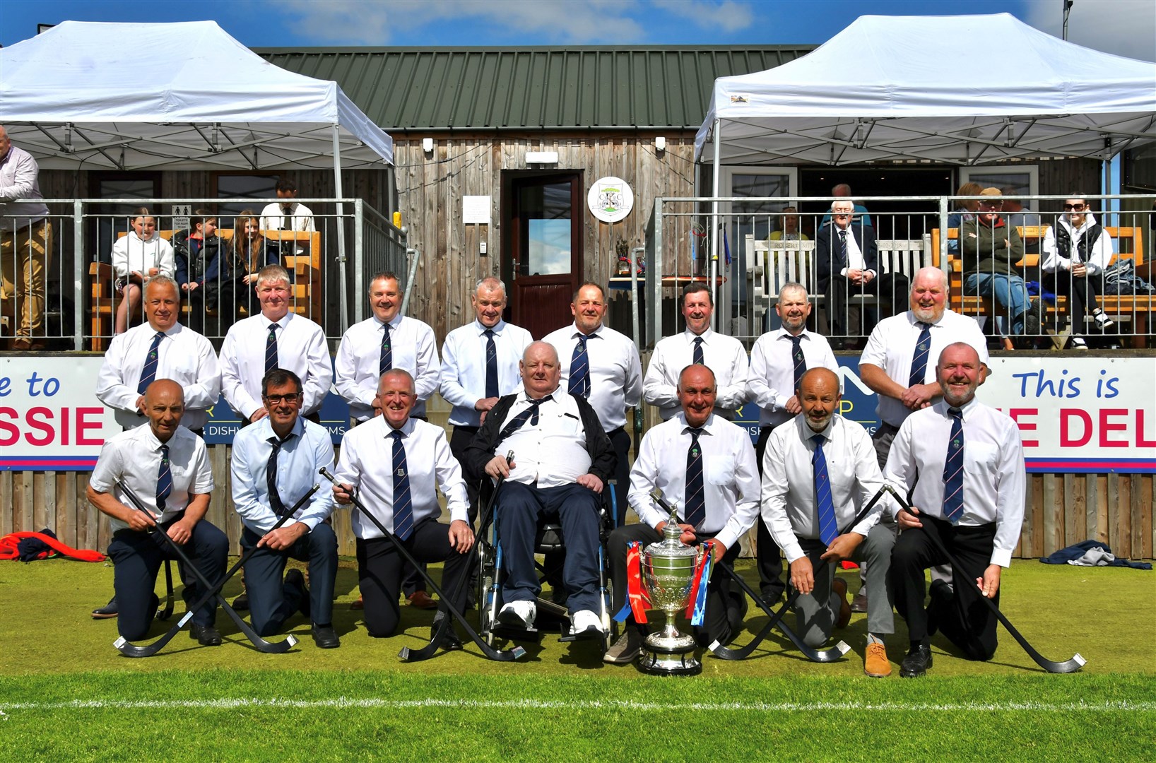 TURNED THE TIDE: The surviving members of the 1984 Grand Slam winning squad who launched Kingussie onto the road for success.