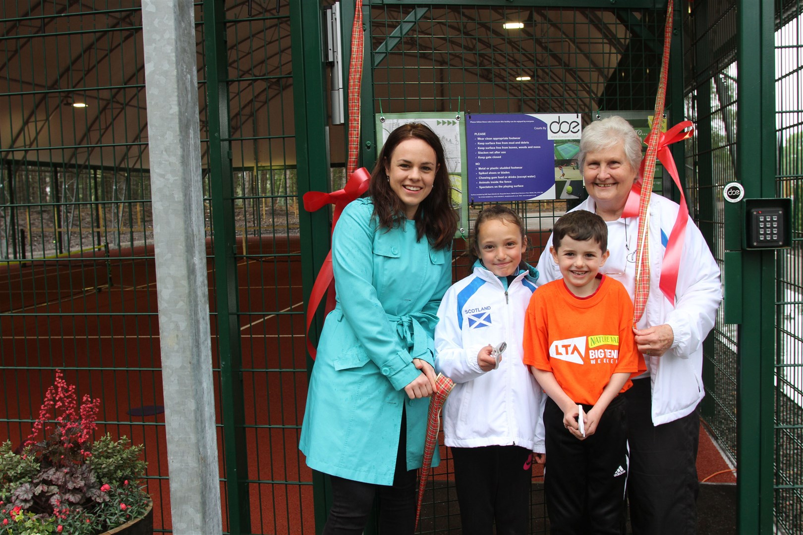 Kate Forbes MSP, Lexi Farquhar, Callum Mackay and Yvonne Birnie perform the honours at the official opening.