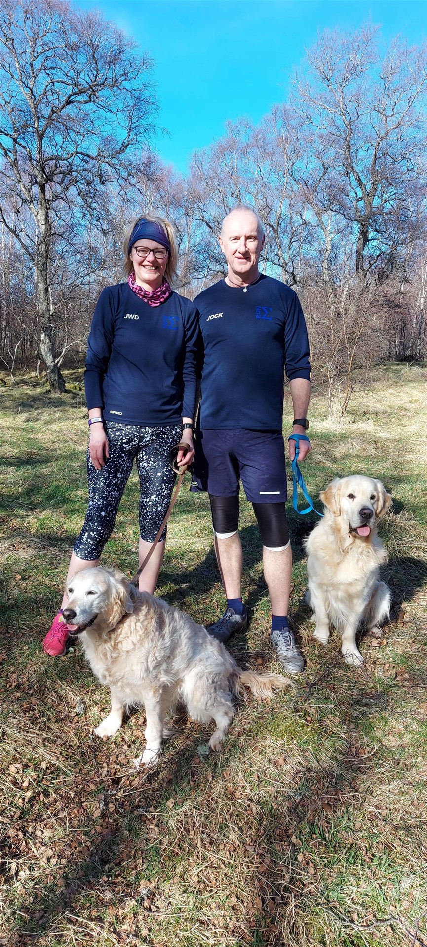 Joanne and John Dryburgh with their dogs on a "beaut" of a day this week.