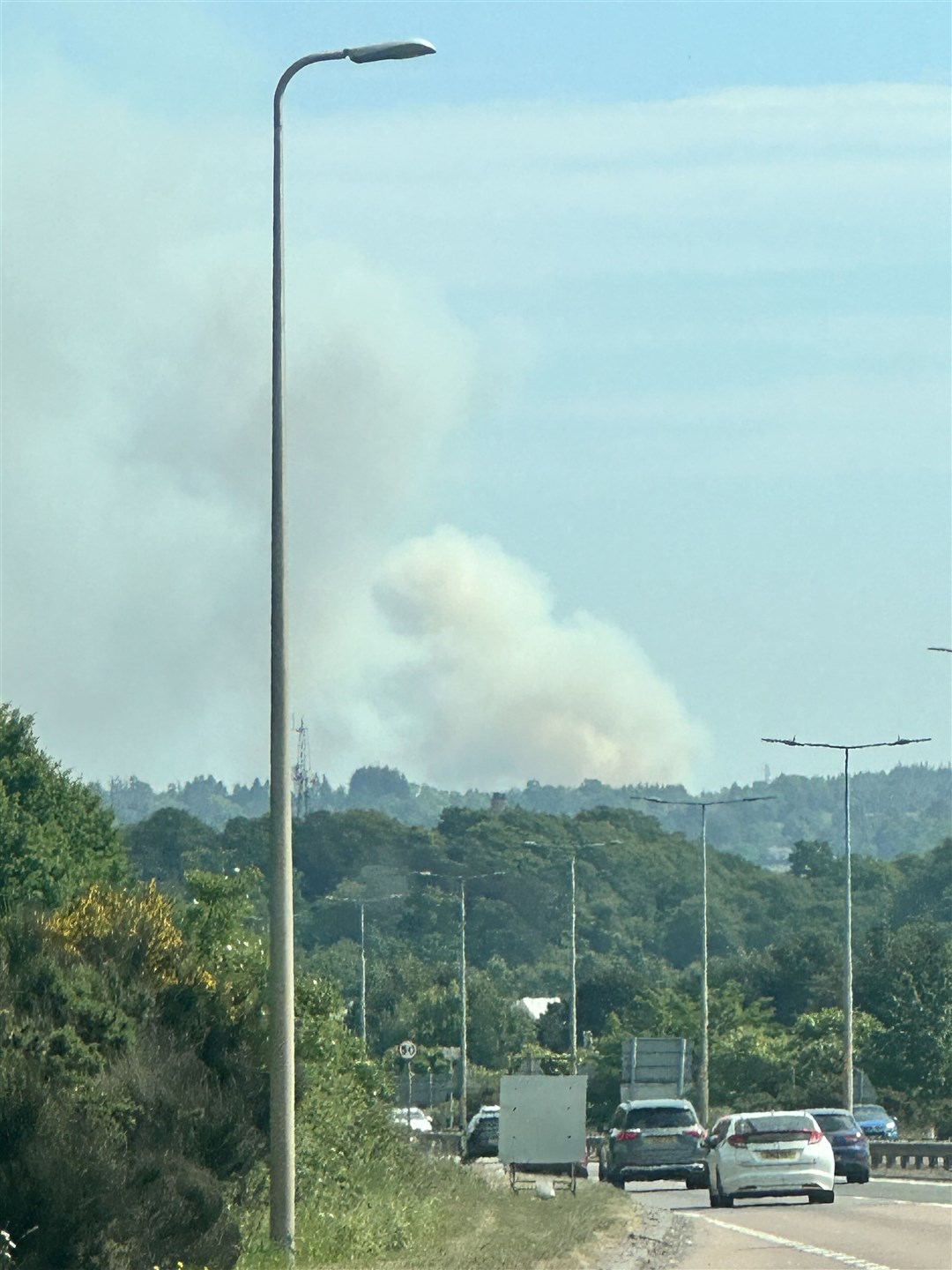 The wildfire has sent a large plume of smoke into the skies south of Inverness.