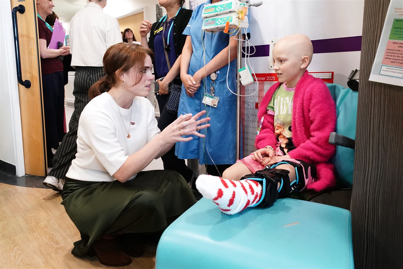 Princess Eugenie speaks to young cancer patient Lola Belle Tucker (Aaron Chown/PA)