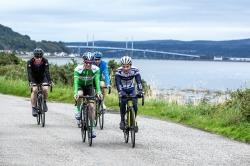 Against the backdrop of the Kessock Bridge, riders in last year’s Vuelta de Isla Negra power round the route. It returns this week for the benefit of all-weather sports facilities in Avoch.