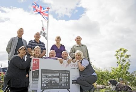 Gala day organisers and Tesco staff with the TV which will be raffled