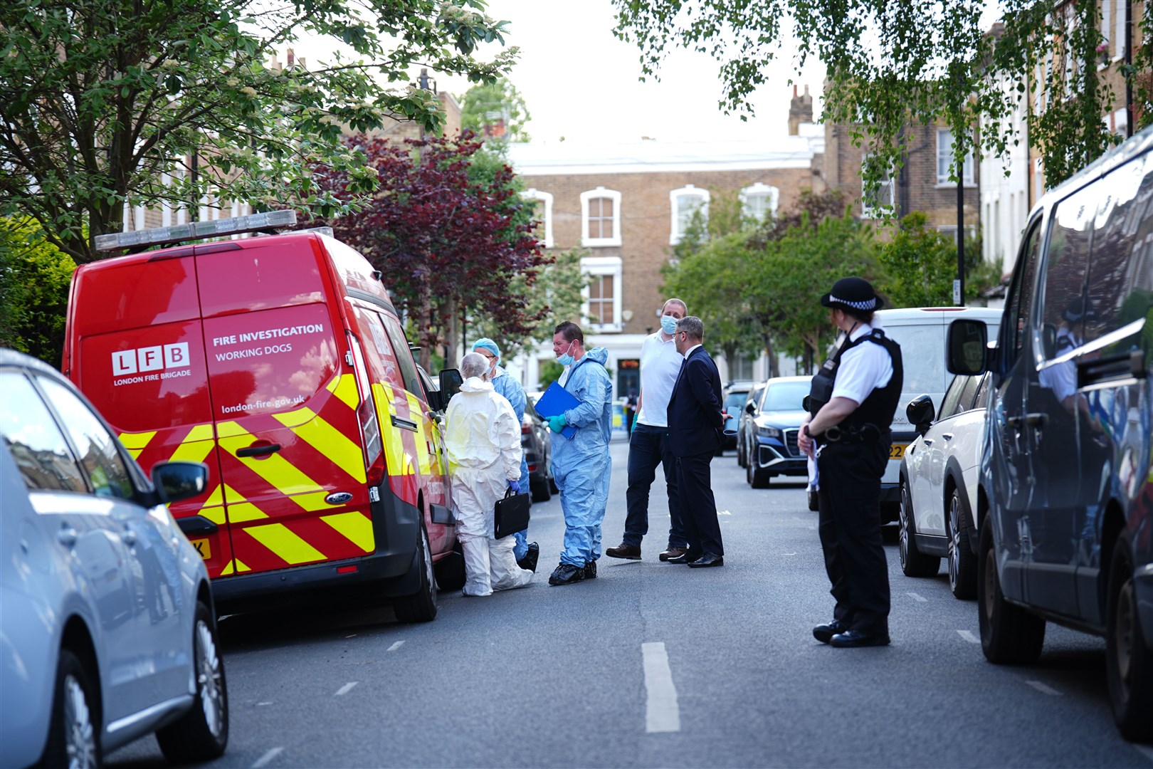 Forensics officers in Kentish Town, north London (James Manning/PA)