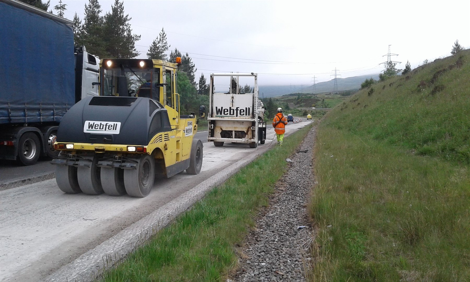 Contractors at work during the 'crack and seat' process.