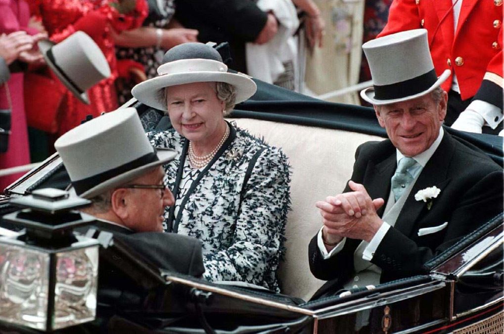 The late Queen Elizabeth II and the late Duke of Edinburgh with Mr Kissinger on their arrival for the first day of Royal Ascot in June 1995 (PA)
