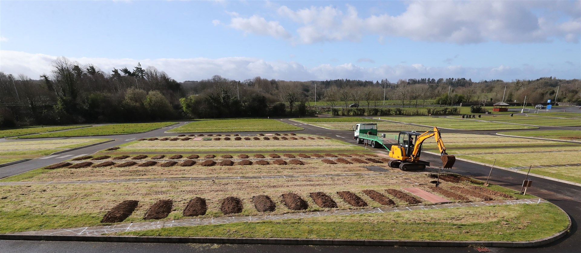 Rows of graves are prepared in Sixmile Cemetery in County Antrim as the coronavirus death toll rose in April (Niall Carson/PA)