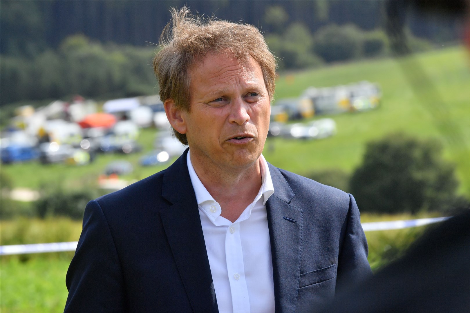 Transport Secretary Grant Shapps speaks to the media during a visit to the scene near Stonehaven, Aberdeenshire (Ben Birchall/PA)