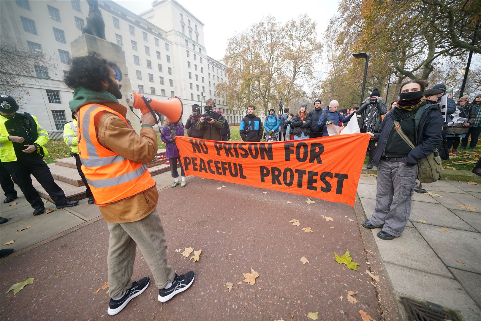 Just Stop Oil protesters demonstrate outside New Scotland Yard (Yui Mok/PA)
