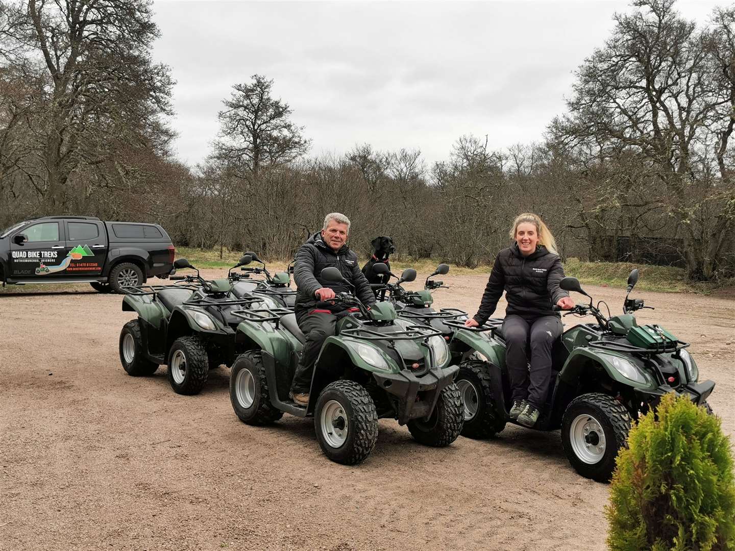 Good to go... Mike and Emma Norton gearing up for a busy quad trekking summer with the help of quad dog, Brora the Explorer.