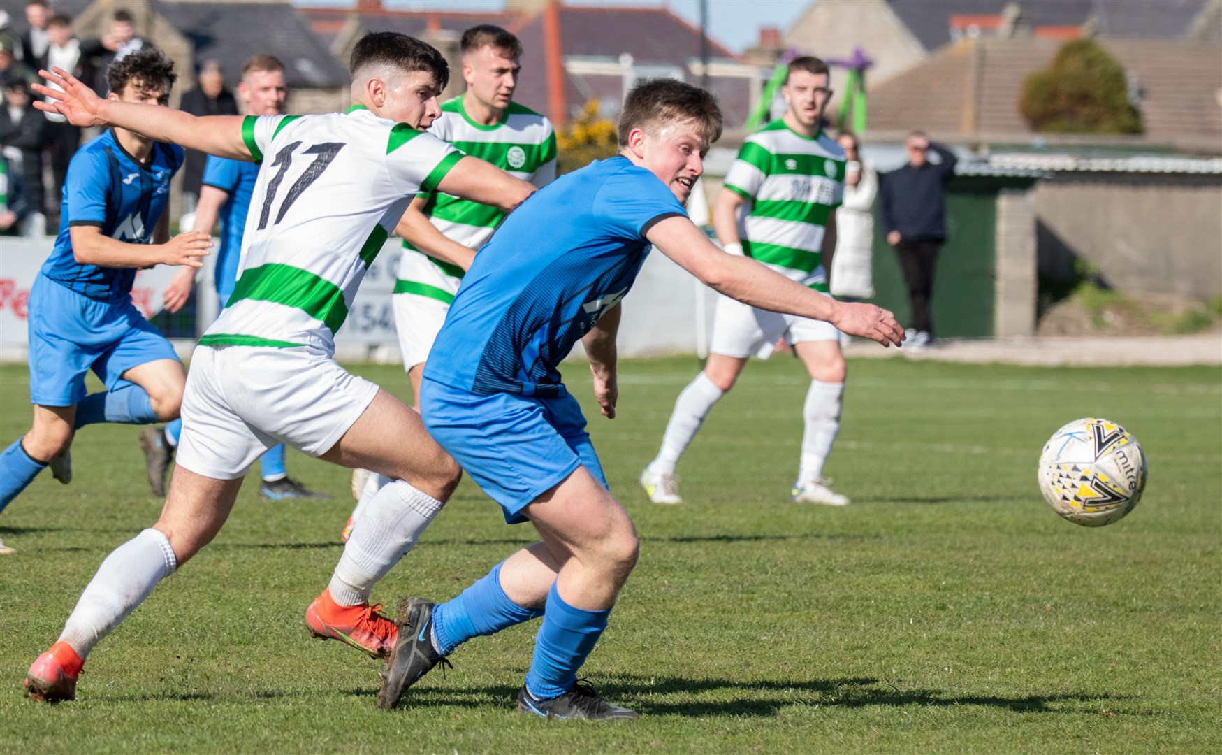 Strathspey's Joe Cuthbert (right) is pulled back by Buckie Thistle's Max Barry...Buckie Thistle FC (5) vs Strathspey Thistle FC (0) - Highland Football League - Victoria Park, Buckie 02/04/2022...Picture: Daniel Forsyth..