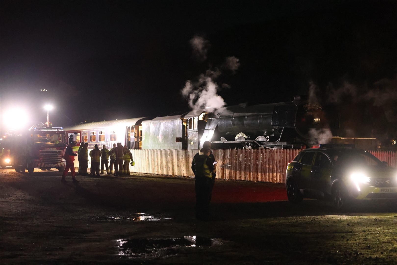 The emergency services at the scene of the accident caused when the Flying Scotsman was trying to couple with the Royal Scotsman carriages.