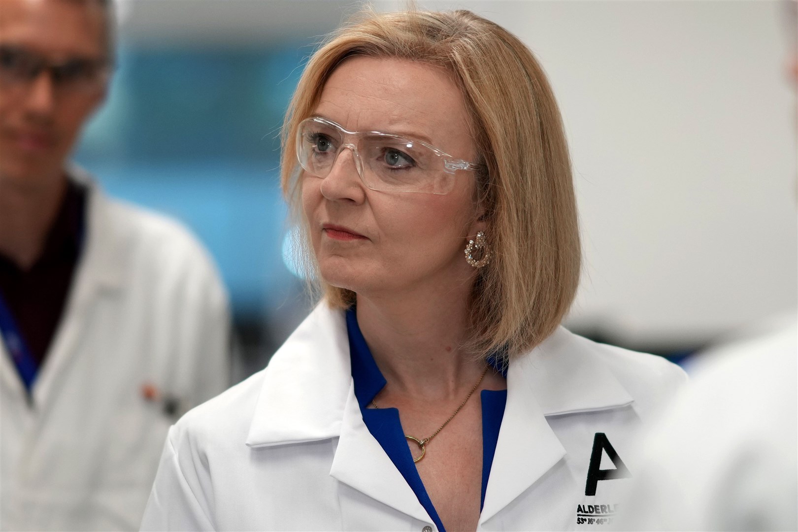Liz Truss speaks to scientists during a campaign visit to a life sciences laboratory at Alderley Park in Manchester (Christopher Furlong/PA)