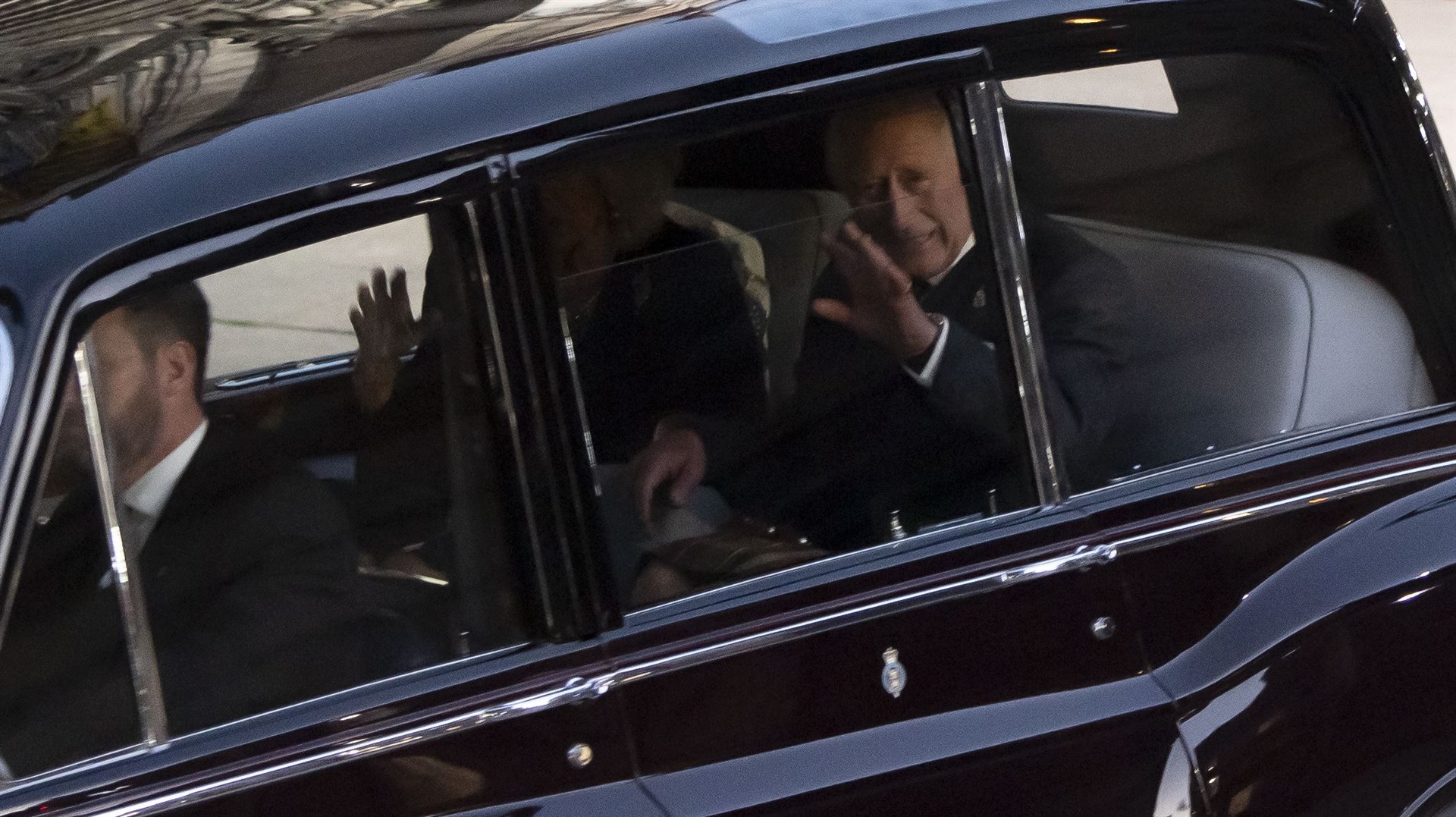 The King and the Queen Consort being driven away from St Giles Cathedral in Edinburgh on Monday (Lesley Martin/PA)
