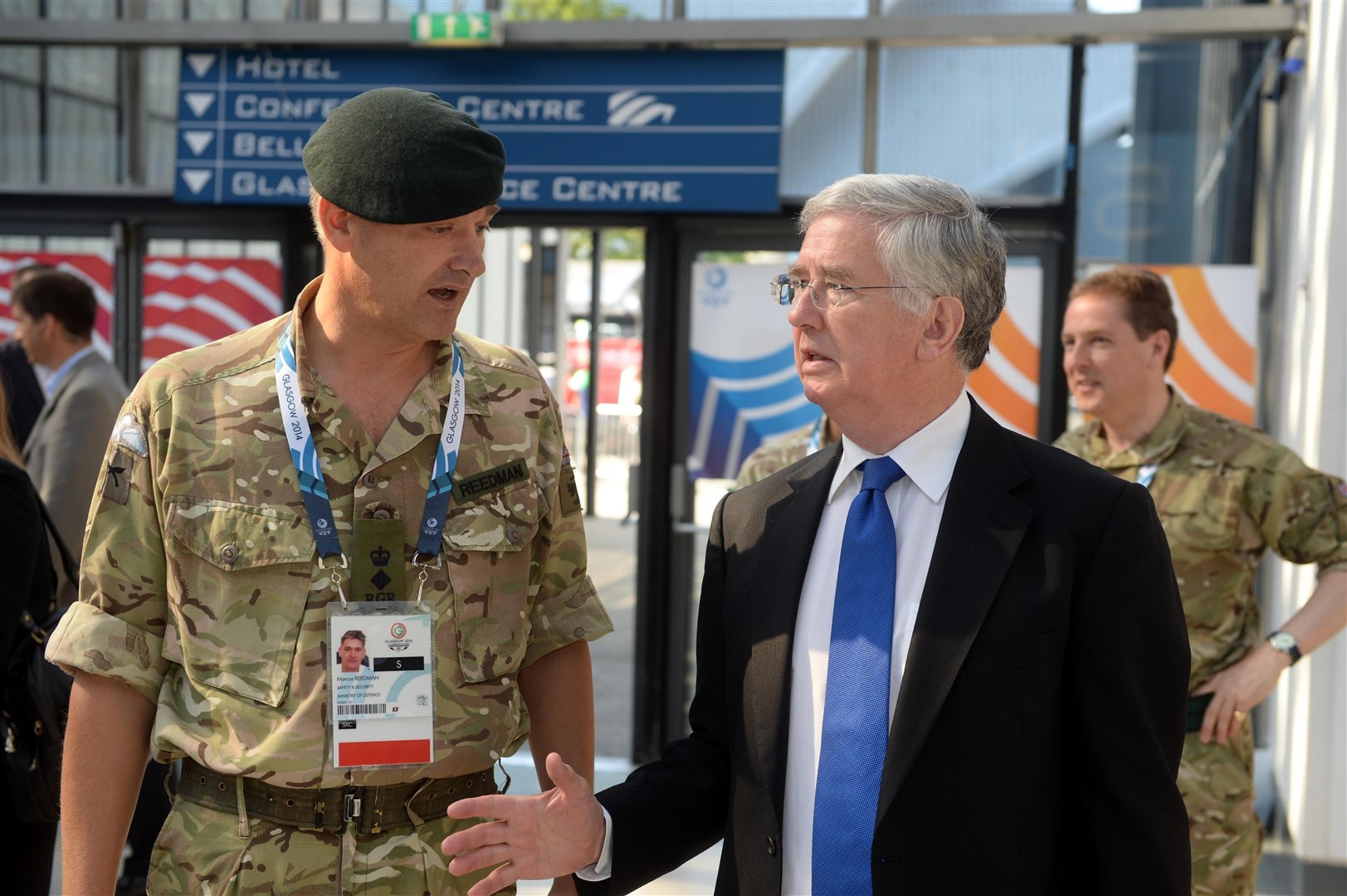 Marcus Reedman, left with the then Defence Secretary Michael Fallon at the Commonwealth Games in Glasgow in 2014 (Mark Owens/PA)