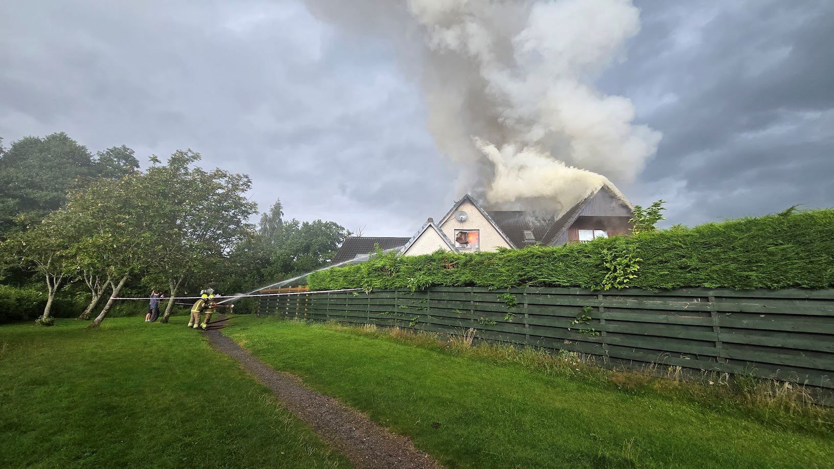 Firefighters try to bring the blaze under control. Picture: Lukas Dembicki.