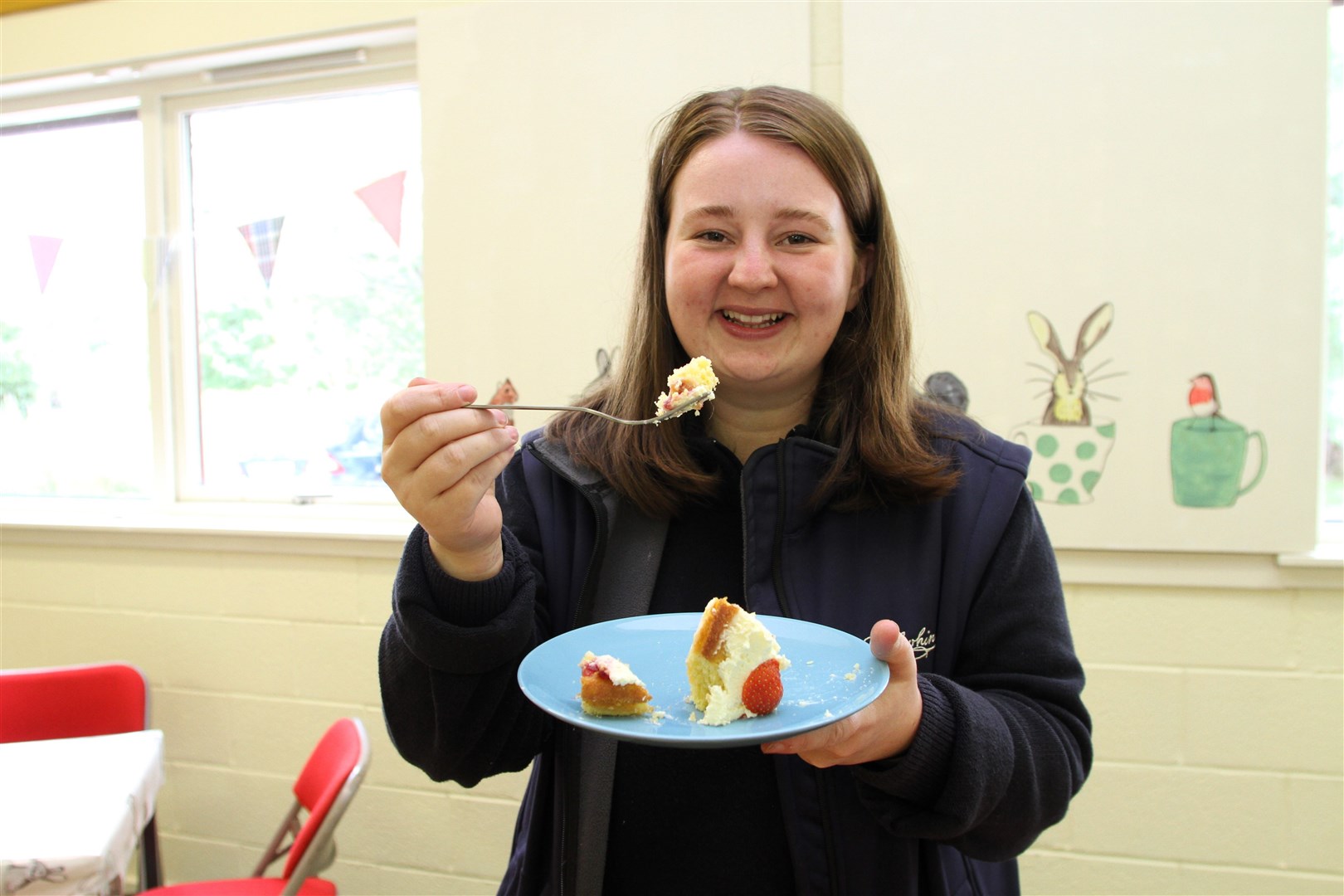 IT'S A PIECE OF CAKE: No problem for Eilidh Latto tackling Dalwhinnie's delicious home baking. (Frances Porter)