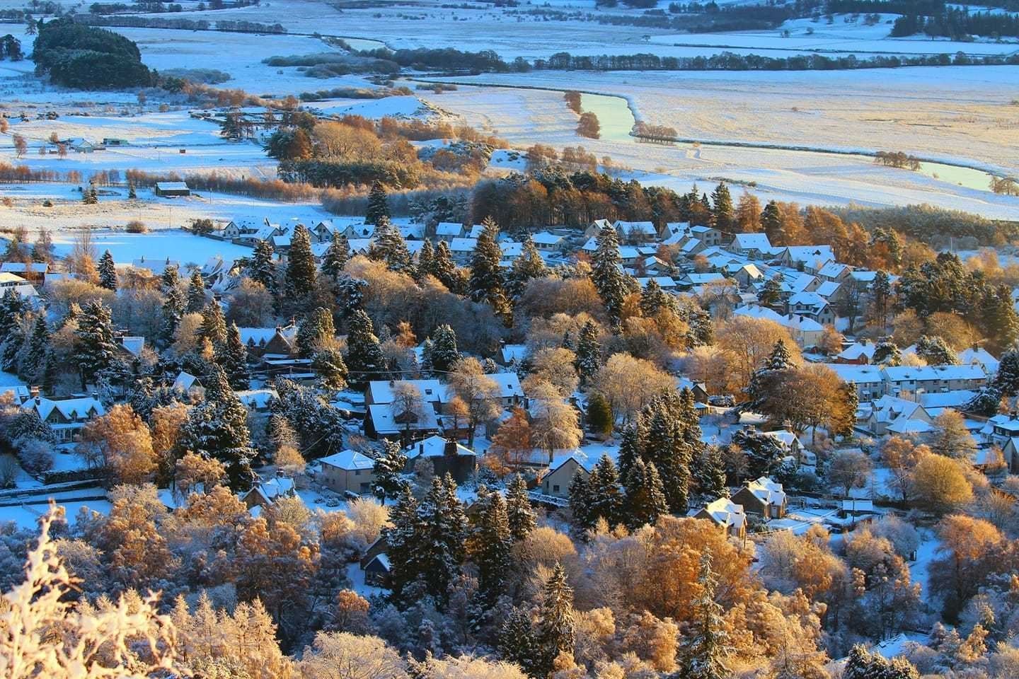 Kingussie pictured by David Macleod as the snow level dropped to street level yesterday