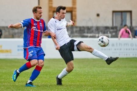 Clachnacuddin’s Struan MacArthur (right) in action against Elgin City during pre-season. Picture: Daniel Forsyth Image No.041588