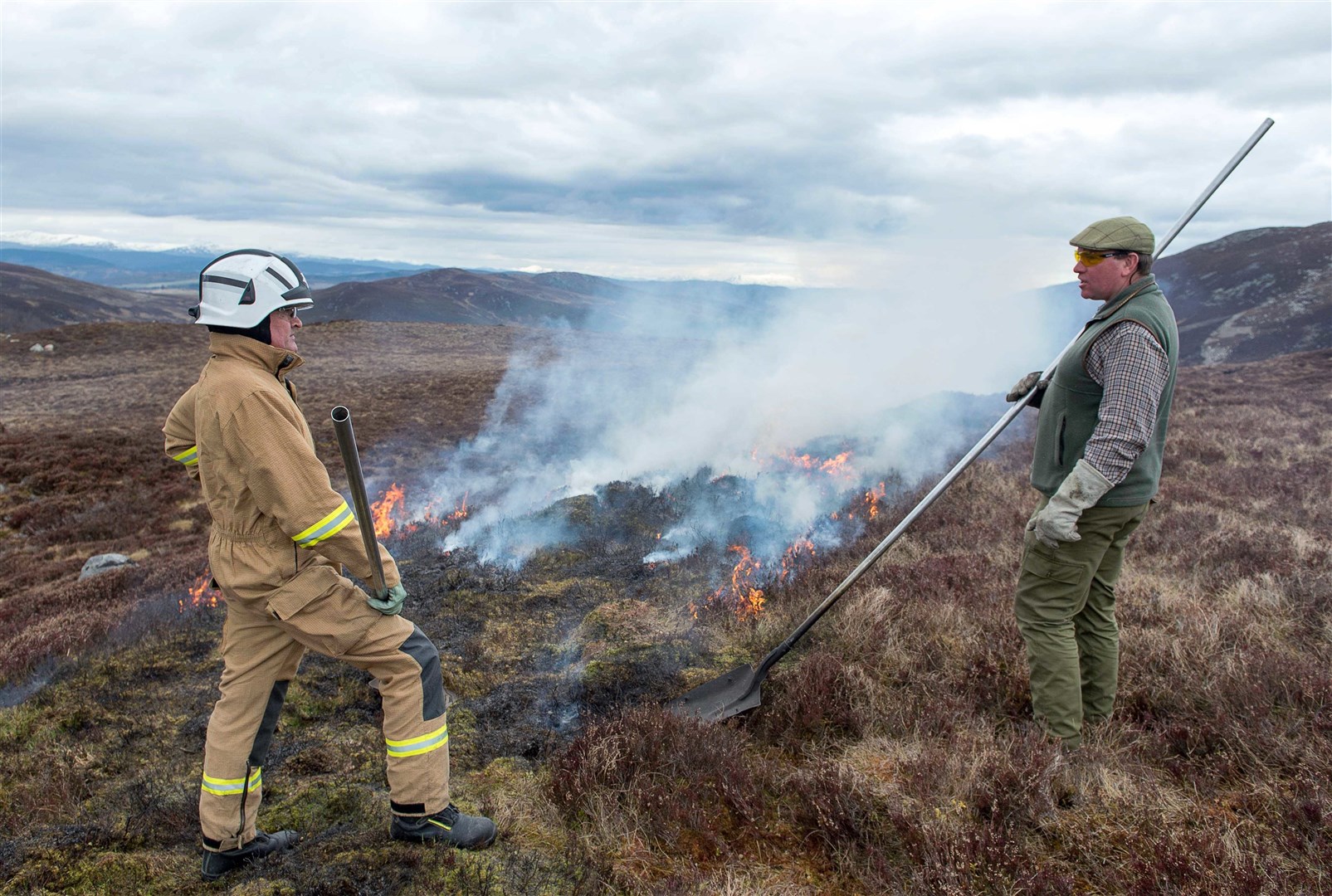 Dunmaglass Estate Head keeper Iain Hepburn and Station Officer Alex McKinley Scottish Fire Service. Picture Trevor Martin