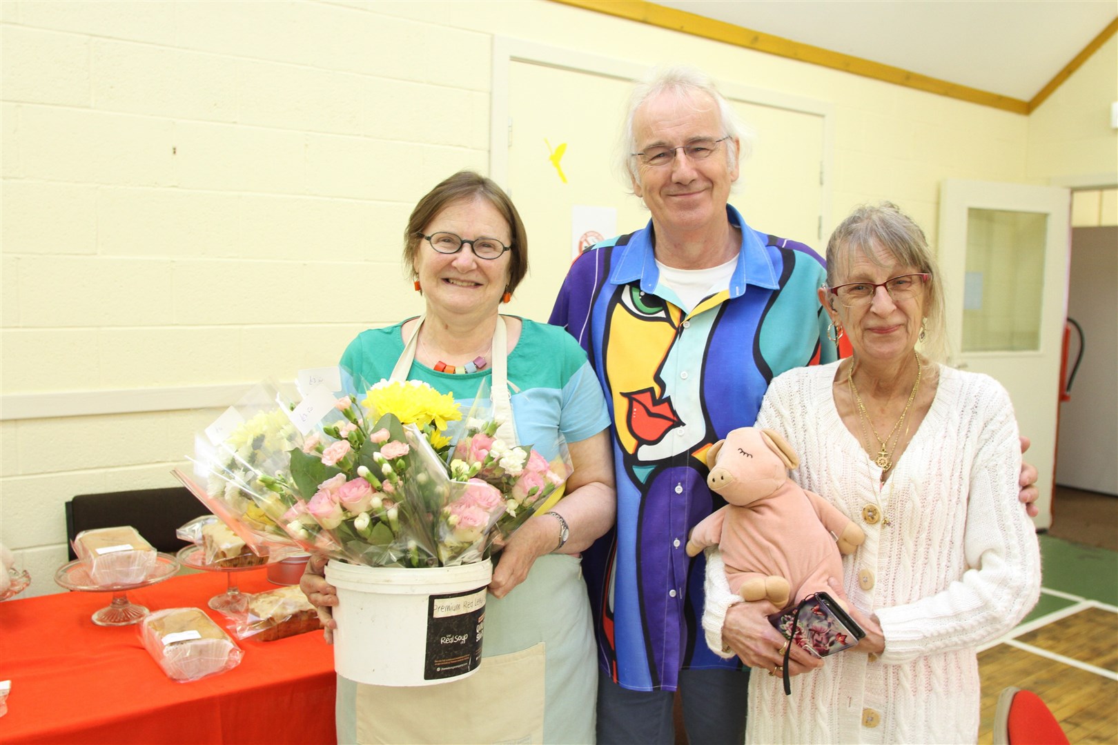 BLOOMING GOOD EFFORT: Three of the stalwarts of the hall association at Lesley and Euan Carr and Fiona Grant. Picture: Frances Porter.