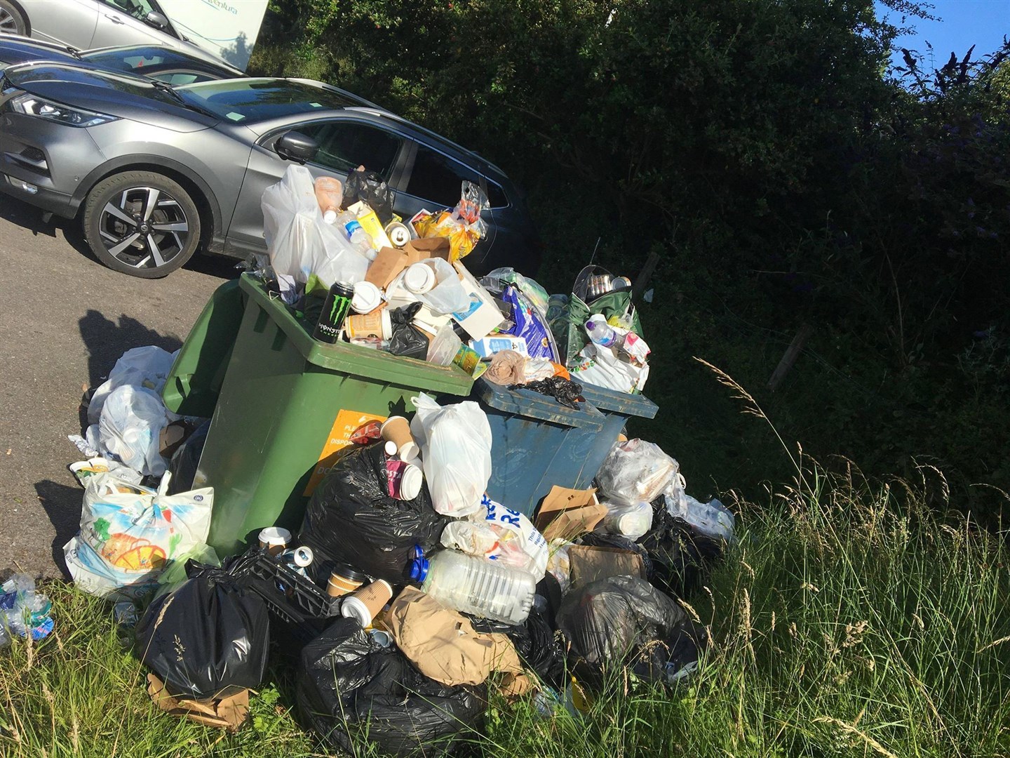 Over-flowing bins on the NC500 lead to rubbish getting blown about some of Scotland's most beautiful areas.