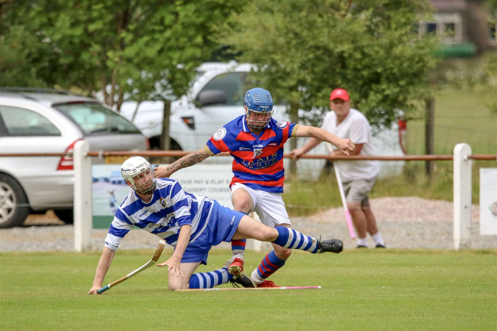 Newtonmore's Rory Kennedy and Kingussie's James Falconer.