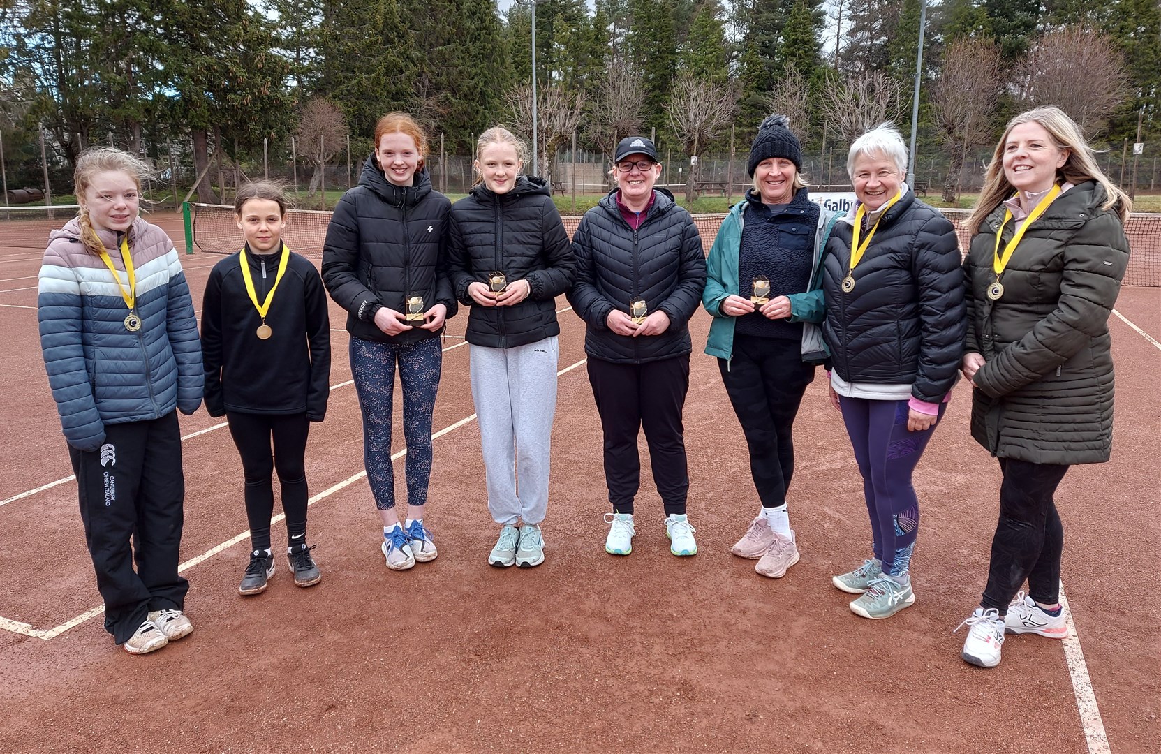 Ladies winners and players Zofia Andrasovska, Maya Kobedza, Rosa Mann, Lizzy Sloan, Jenny Milne, Lisa Nairn, Riana Oeschger and Isla Dickinson.