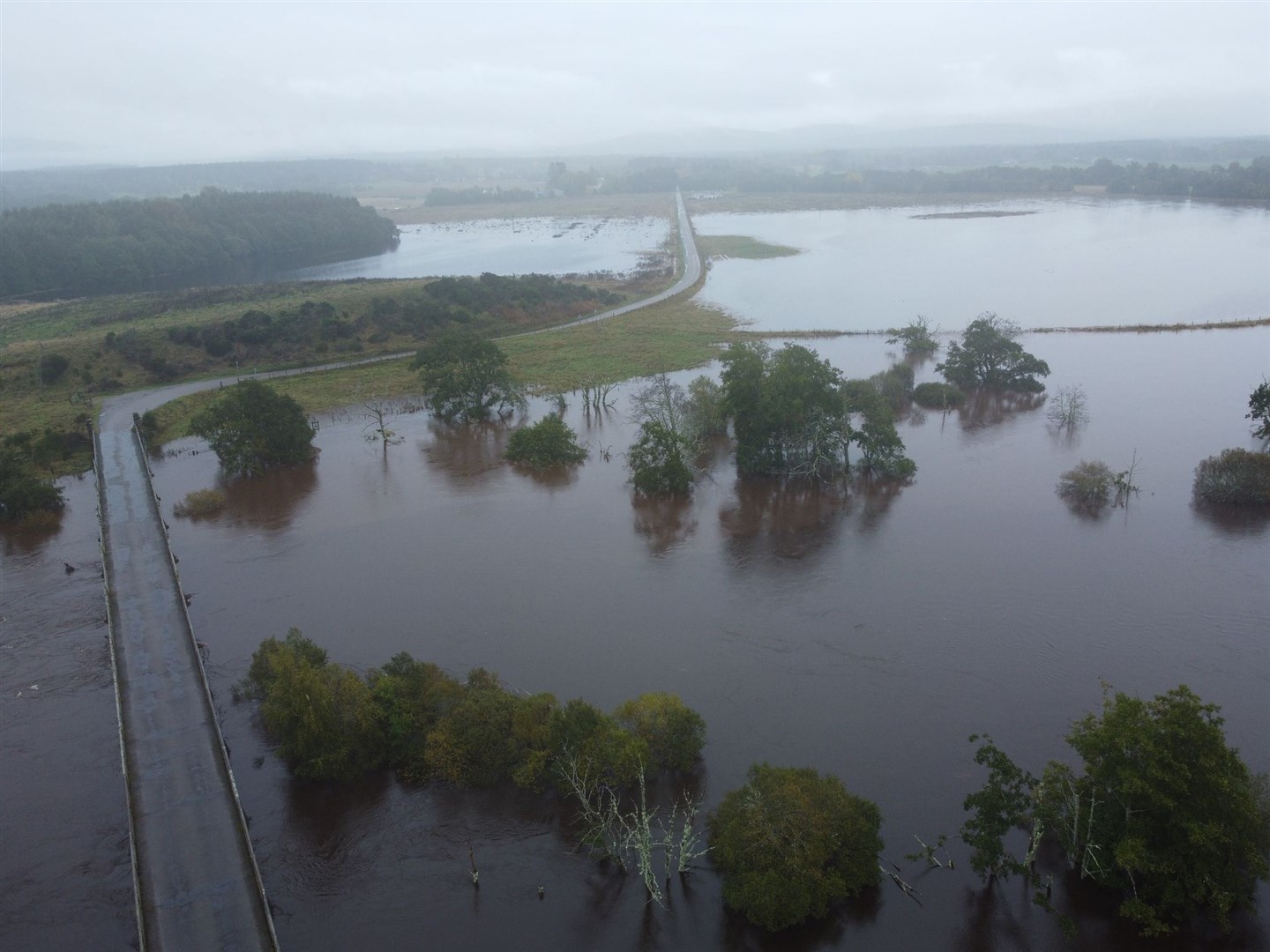 The long and winding flood: Strathspey under water this afternoon just south of Grantown. Picture by Sandrone