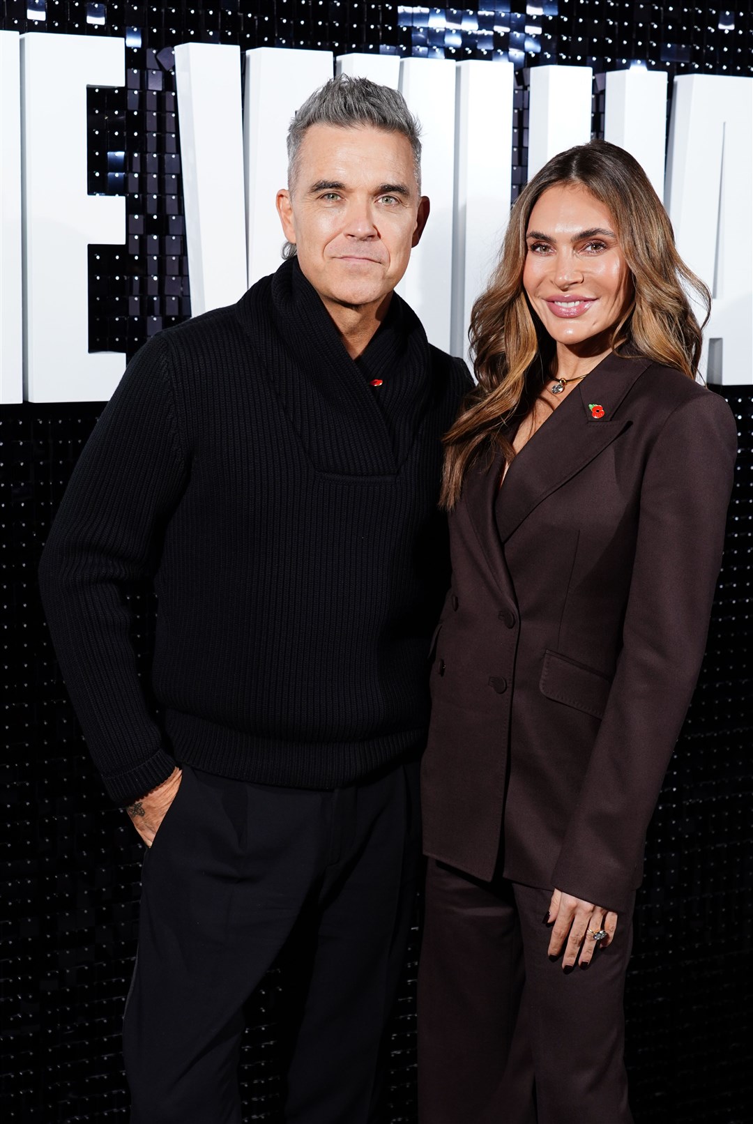 Robbie Williams and his wife Ayda Field (Ian West/PA)