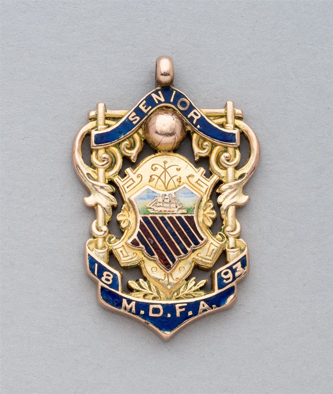 The earliest Manchester United football medal, when the club was known as Newton Heath, is also being sold (Graham Budd Auctions/PA)
