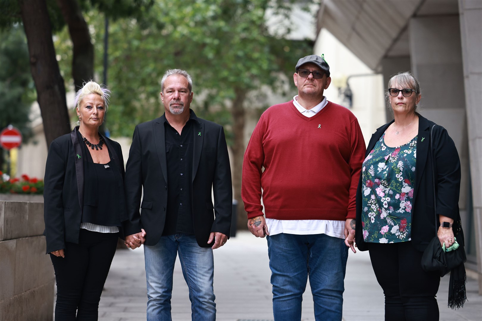 The parents and step-parents of Harry Dunn, Charlotte Charles, Bruce Charles, Tim Dunn and Tracey Dunn (Aaron Chown/PA)