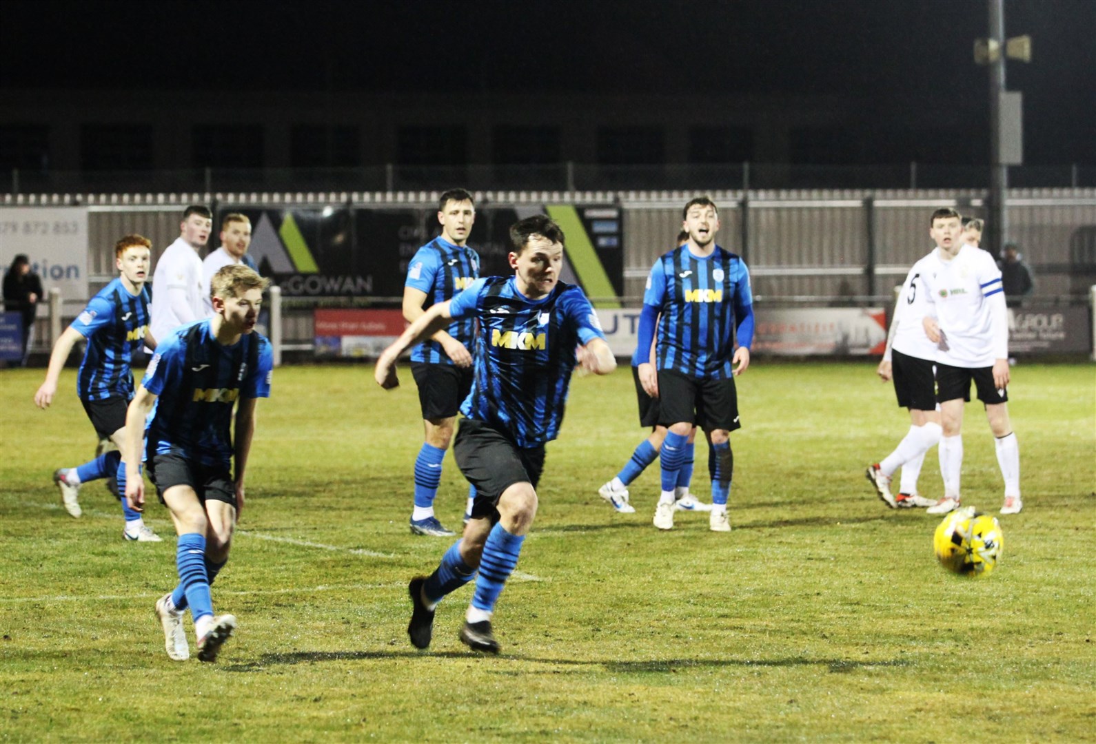Thsitle's Conor MacPhee gets to the ball first during last night's loss to Clach.