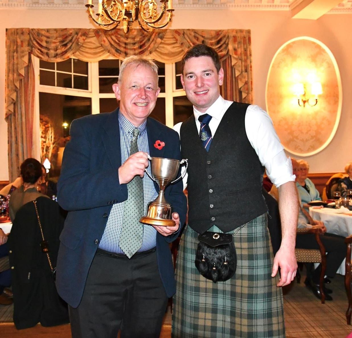 Young player of the year Iain Fraser with Kingussie first team captain Calum Grant who handed out the trophies at the ceremony at the town’s Duke of Gordon Hotel.
