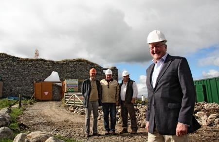 Mr Ewing at the castle entrance with trust chairman Richard Eccles, trustee Stuart Black and project co-ordinator Doug Fleming