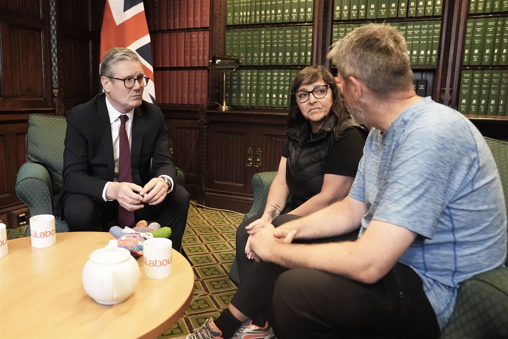 Figen Murray, mother of Manchester Arena bombing victim Martyn Hett, and her husband Stuart speaking to Sir Keir Starmer (Stefan Rousseau/PA)