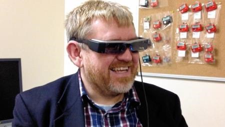 Chris Bryson, of Summit, sports the Epson BT-200 specs