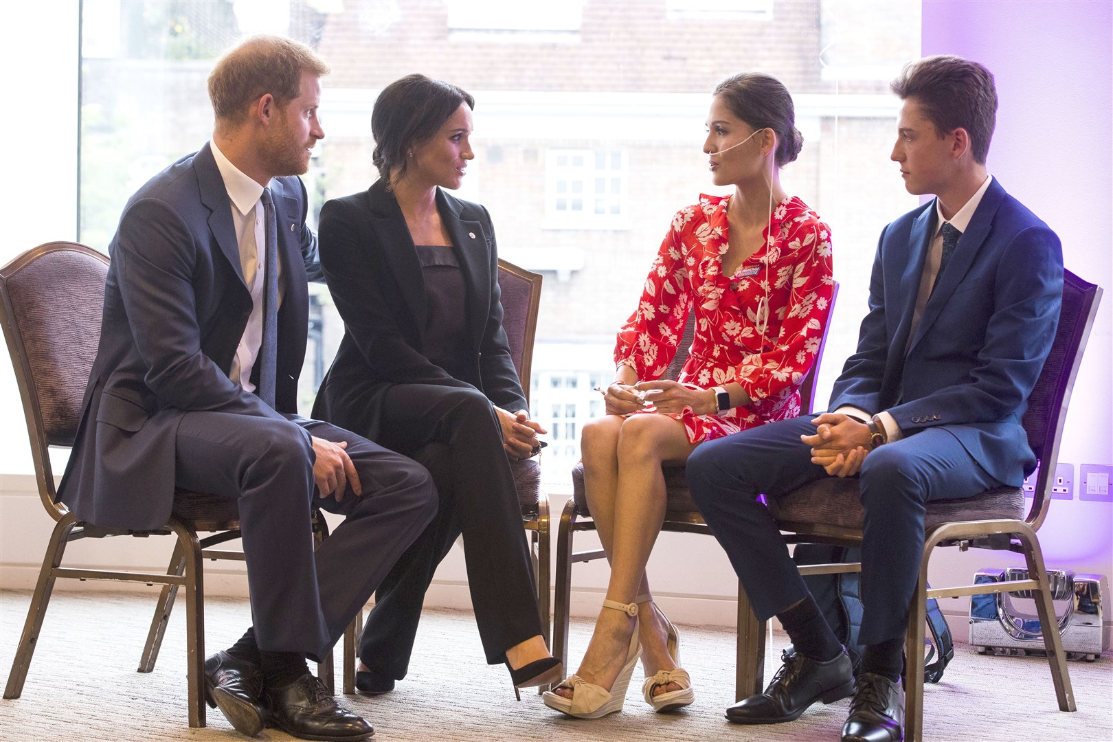 The Duke and Duchess of Sussex with Evie Toombes and her brother Rocco during the 2018 WellChild Awards (Victoria Jones/PA)