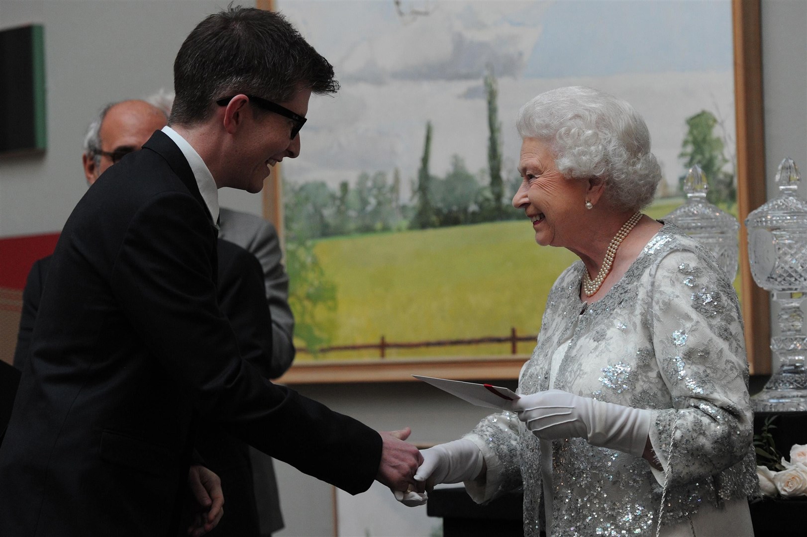 The Queen presents Gareth Malone with a Diamond Award for his contribution to British culture (Carl Court/PA)