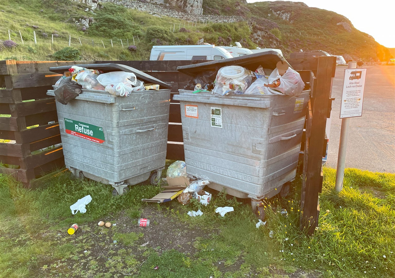 Overflowing wastebins on the NC500 at Loch Clash motorhome stopover, Kinlochbervie.