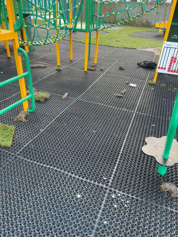 Trashed: Dollops of ripped up turf were left on the new play area